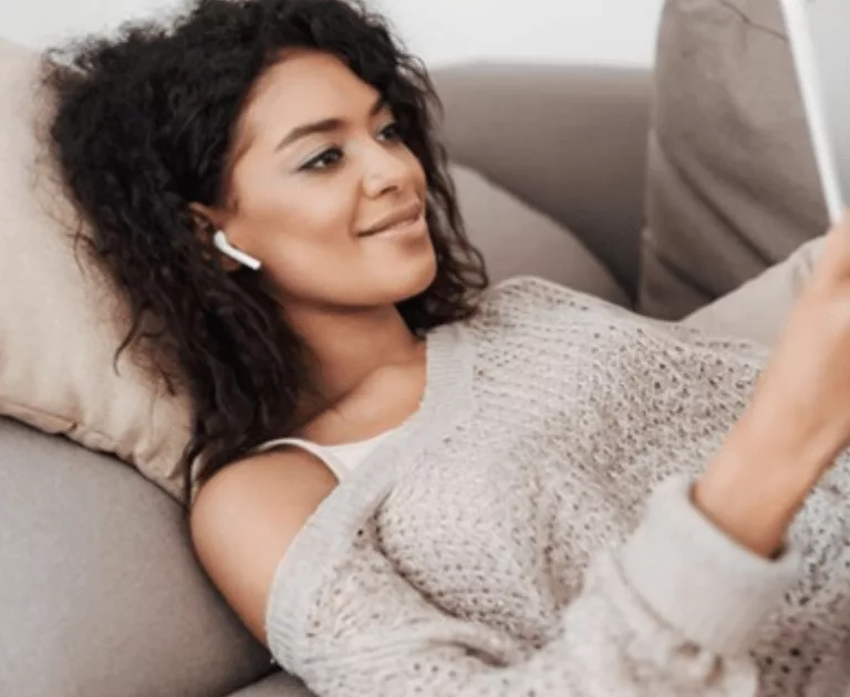 Woman laying on couch