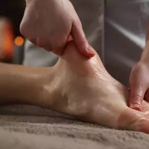 client getting foot massage